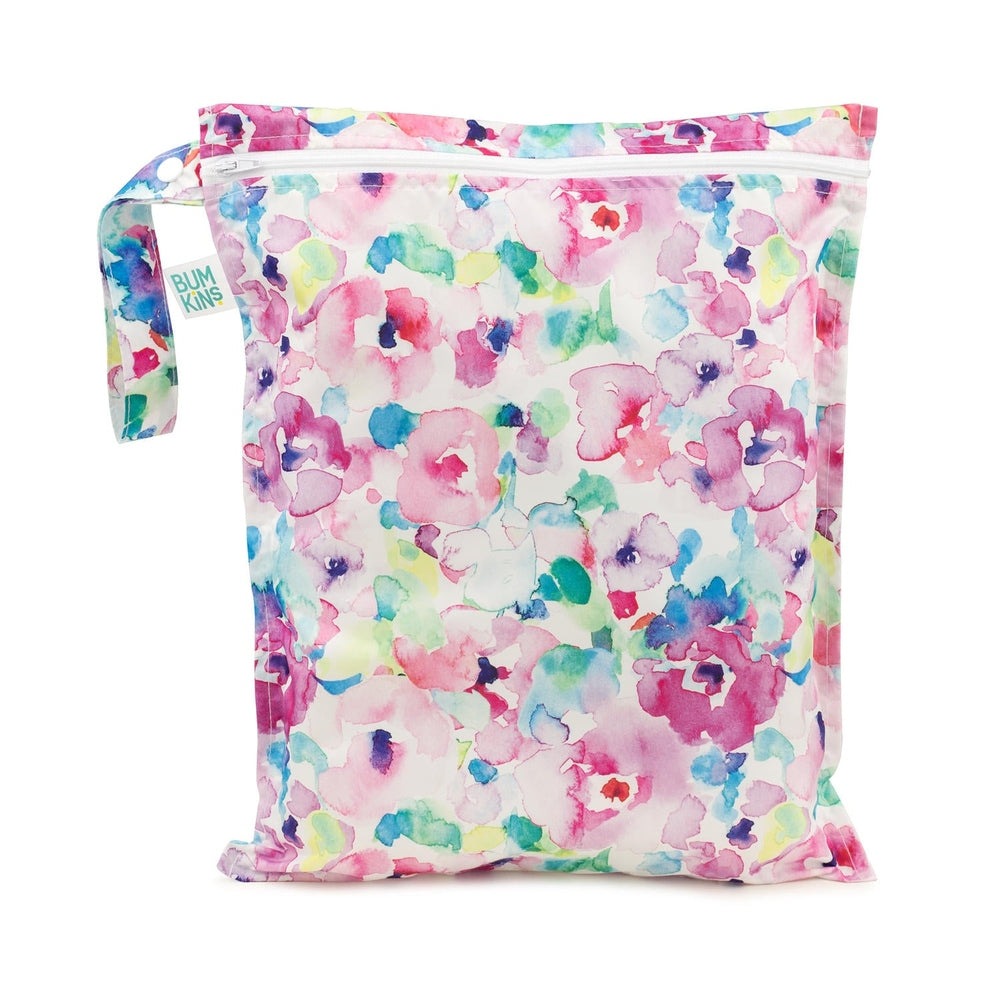 Bumkins diaper wet bag watercolor flower print in pastel pink, purple, and blue