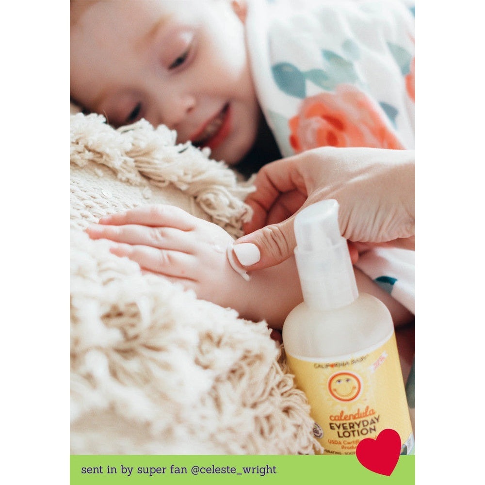 California Baby Calendula Everyday Lotion bottle with pump applied to a baby's hands