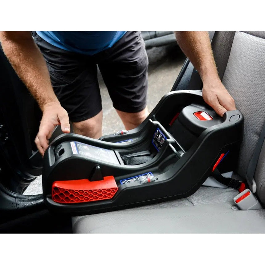 Car Seat Checkup by BABY ENROUTE; technician installs an infant car-seat base in a car.