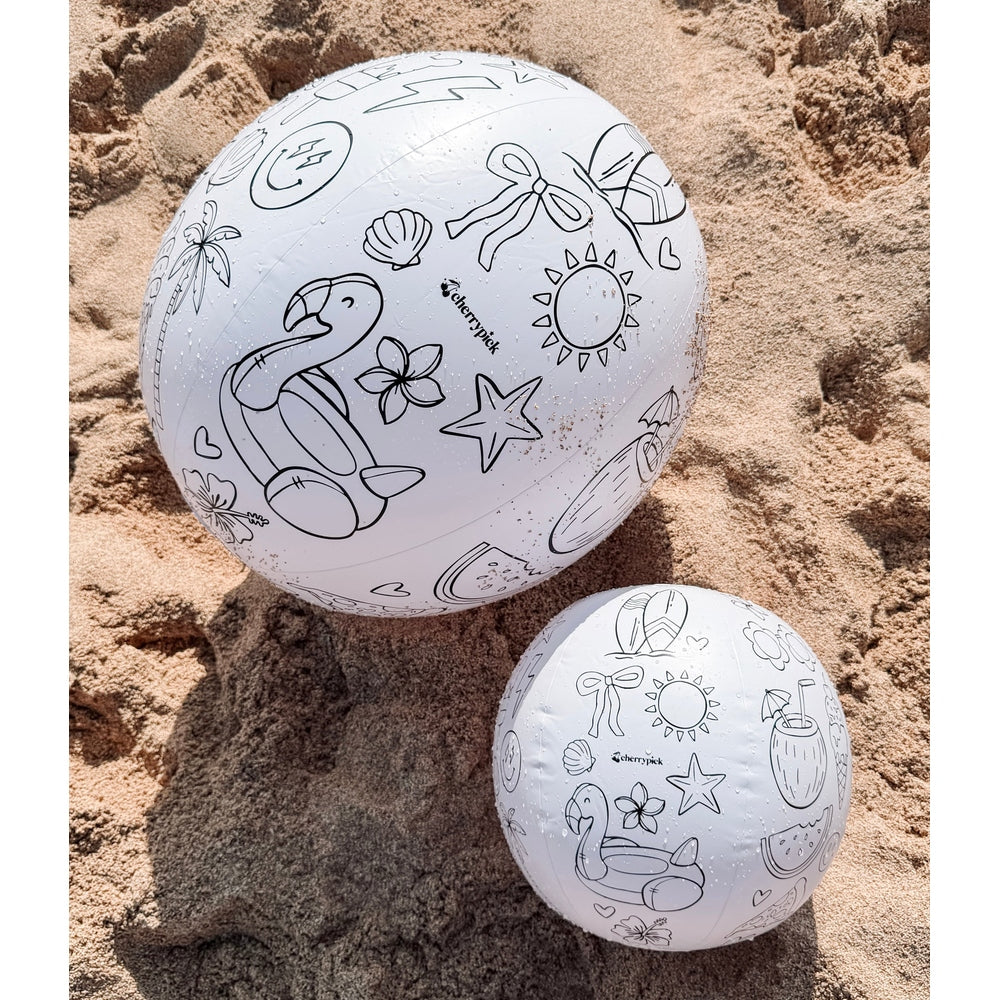 Cherrypick Design Your Own Beach Ball Kit uncoloured balls on sand