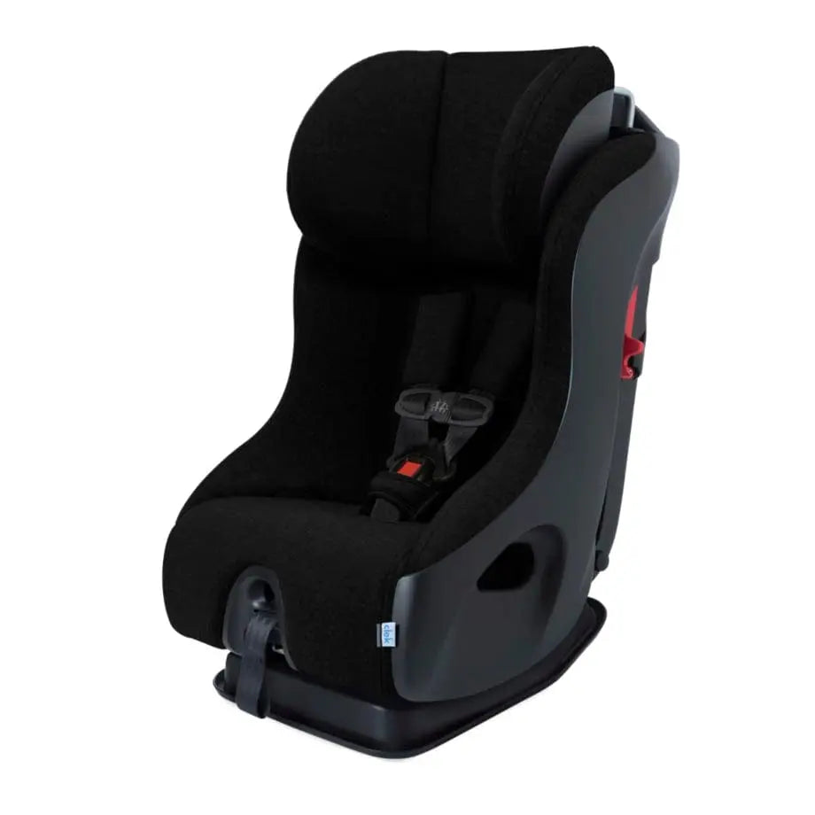 Clek Fllo convertible car seat in black fabric with gray shell, showing a buckled 5-point harness.
