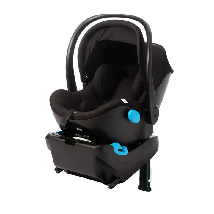 Clek Liing infant car seat with base, black fabric, blue adjustment knob securing the seat.