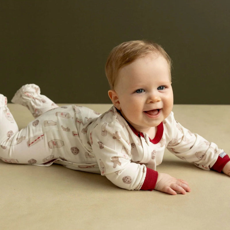 COCCOLI infant zipper footie in cream with cookies pattern, red cuffs, cotton TENCEL™ Modal fabric