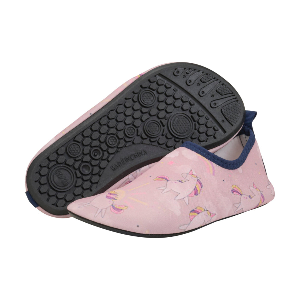 Color Kids Swim Shoes Woodrose for kids, pink unicorn pattern with navy trim, shown with textured non-slip sole.