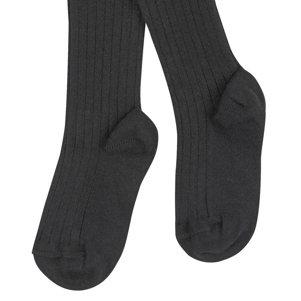 Condor Basic Rib Tights Black for babies, rib-knit footed tights shown warming small feet.