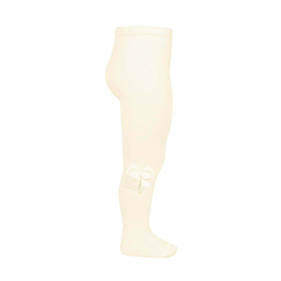 Condor Tights With Side Grosgrain Bow Beige, soft baby tights shown with a side grosgrain bow on the leg.