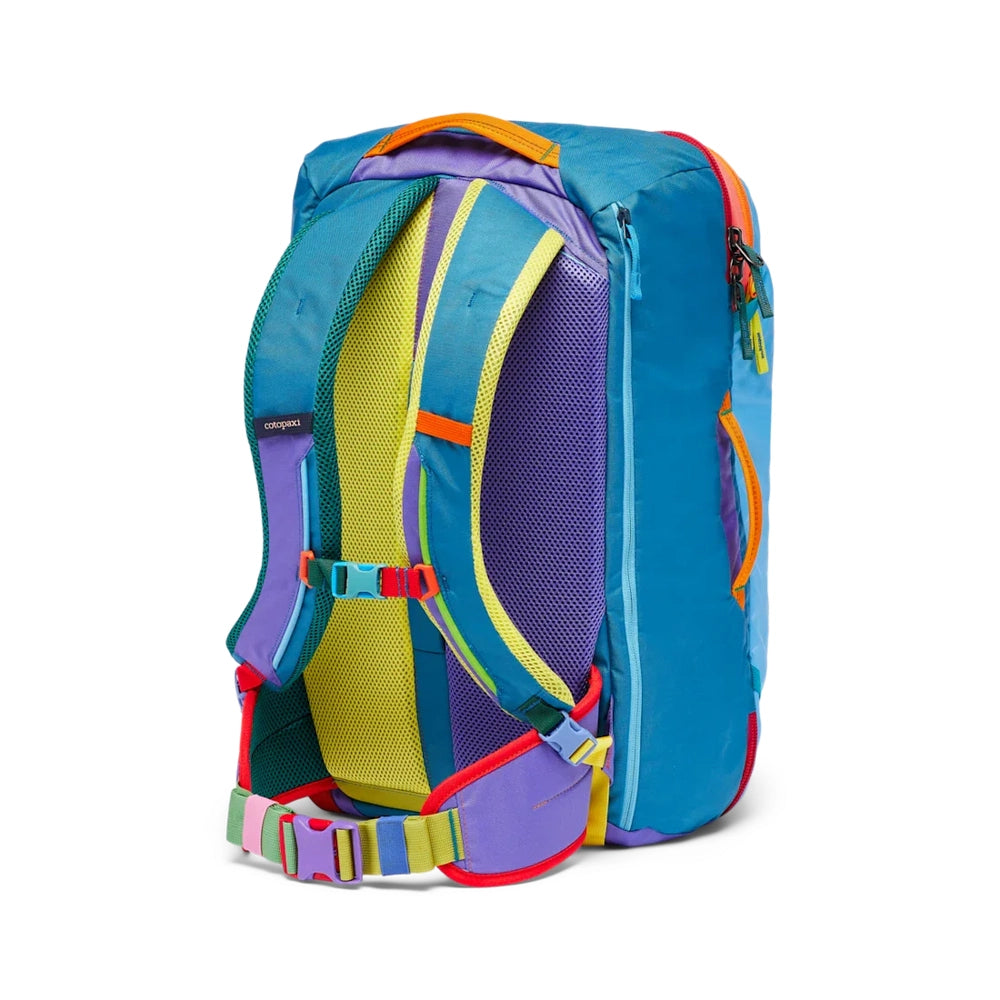 Cotopaxi Allpa 35L Travel Pack in teal blue with purple mesh back panel and multicolor straps