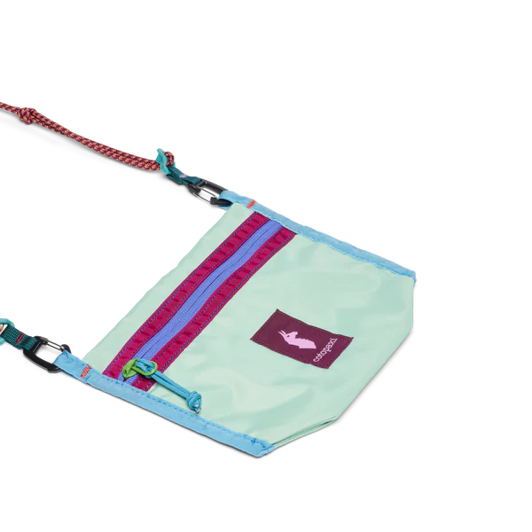 Cotopaxi Lista 2L Crossbody Bag in Mint Turquoise with Purple Zippers and Multicolor Strap