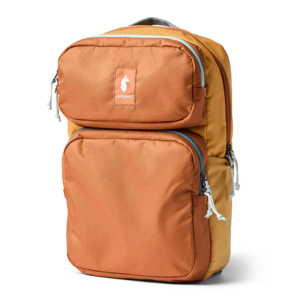 Cotopaxi Tasra 16L Daypack in Rust Orange with front zip pockets