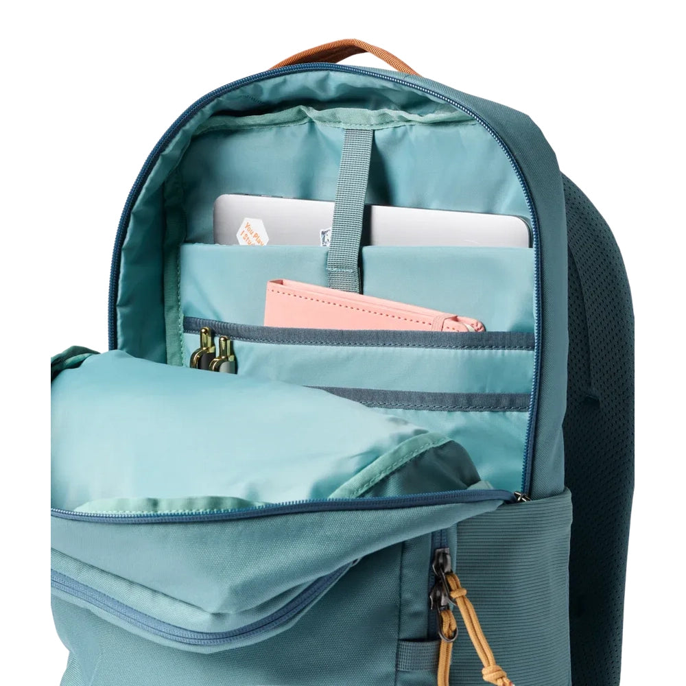 Cotopaxi Tasra 16L Daypack in Teal with turquoise lining and organized front pockets plus laptop sleeve