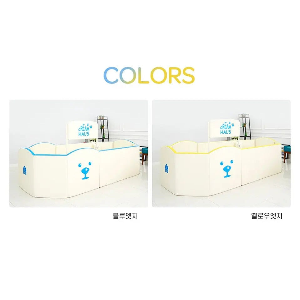 Creamhaus Grand Ice Castle Up Bt baby safety playpen with blue trim, two curved-wall units forming a safe enclosure.