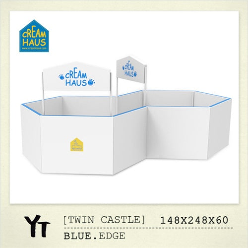 Creamhaus Twin Castle playpen in white with blue edge, two castle-top panels form a secure, enclosed play area.