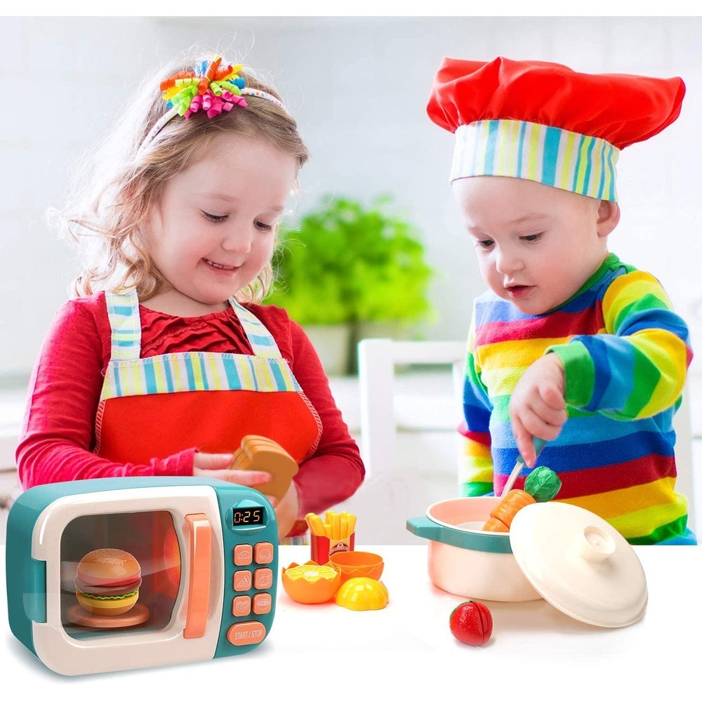 Cute Stone microwave playset with teal appliance and colorful pretend foods; kids playing.