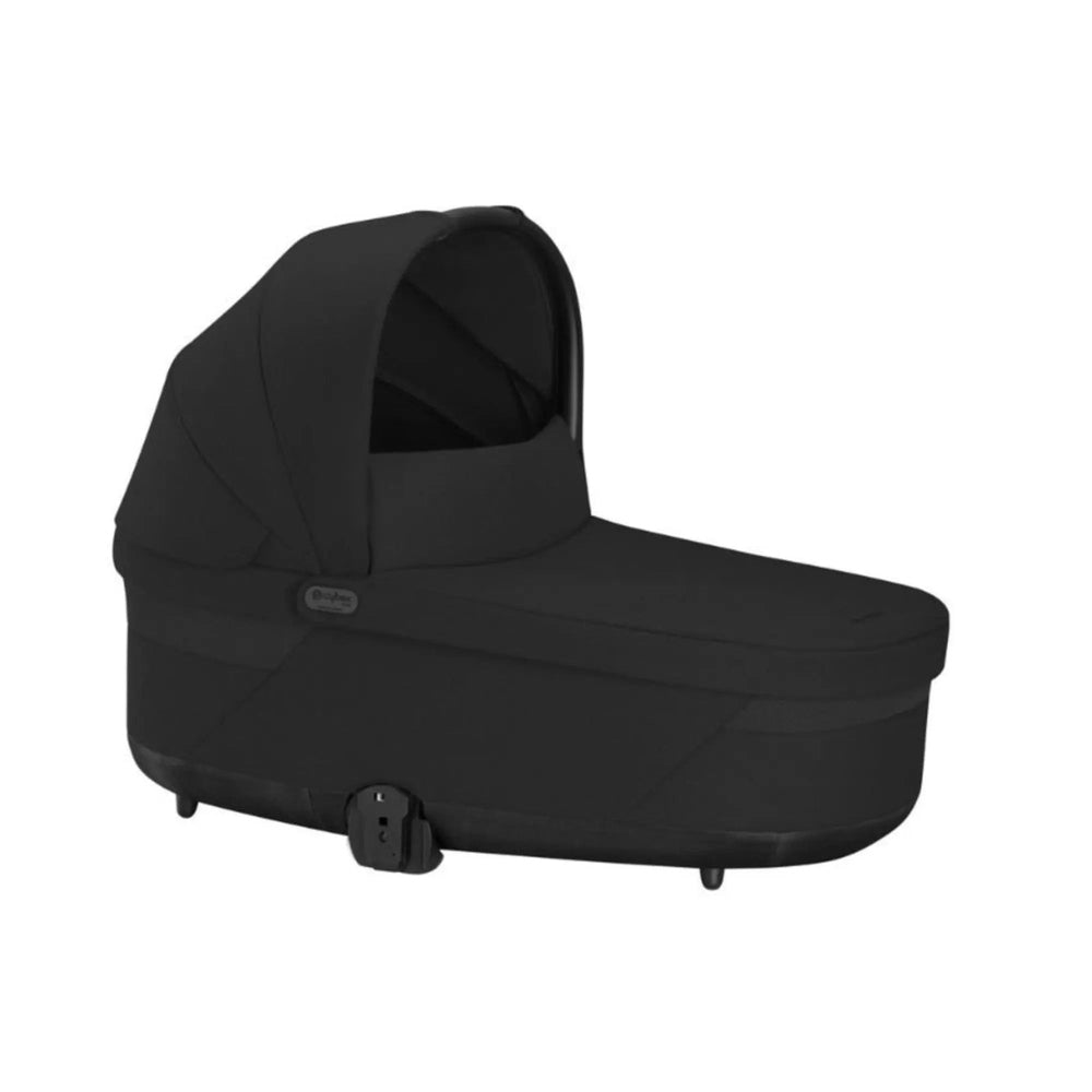 Cybex Balios S Lux cot bassinet in black with canopy mounted on a stroller base.