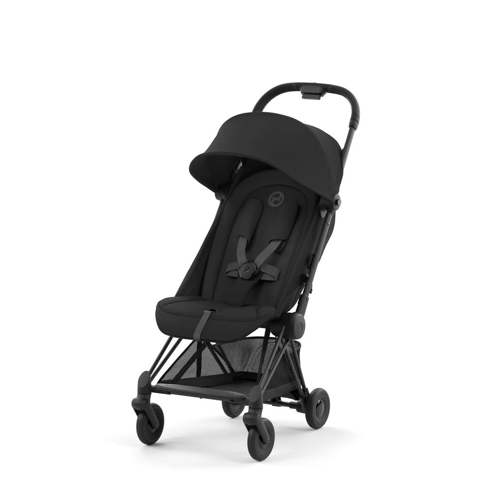 Cybex Coya Matt Black Frame Stroller with black canopy, 4‑wheel chassis, and mesh storage basket.