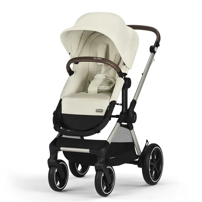 CYBEX EOS Lux 2-in-1 Stroller in cream beige with extended canopy, brown handlebar, and rugged wheels.