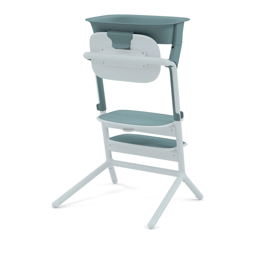 Cybex Lemo Training Tower in white with teal cushions, showing a sturdy frame and fold-out tray for toddlers.
