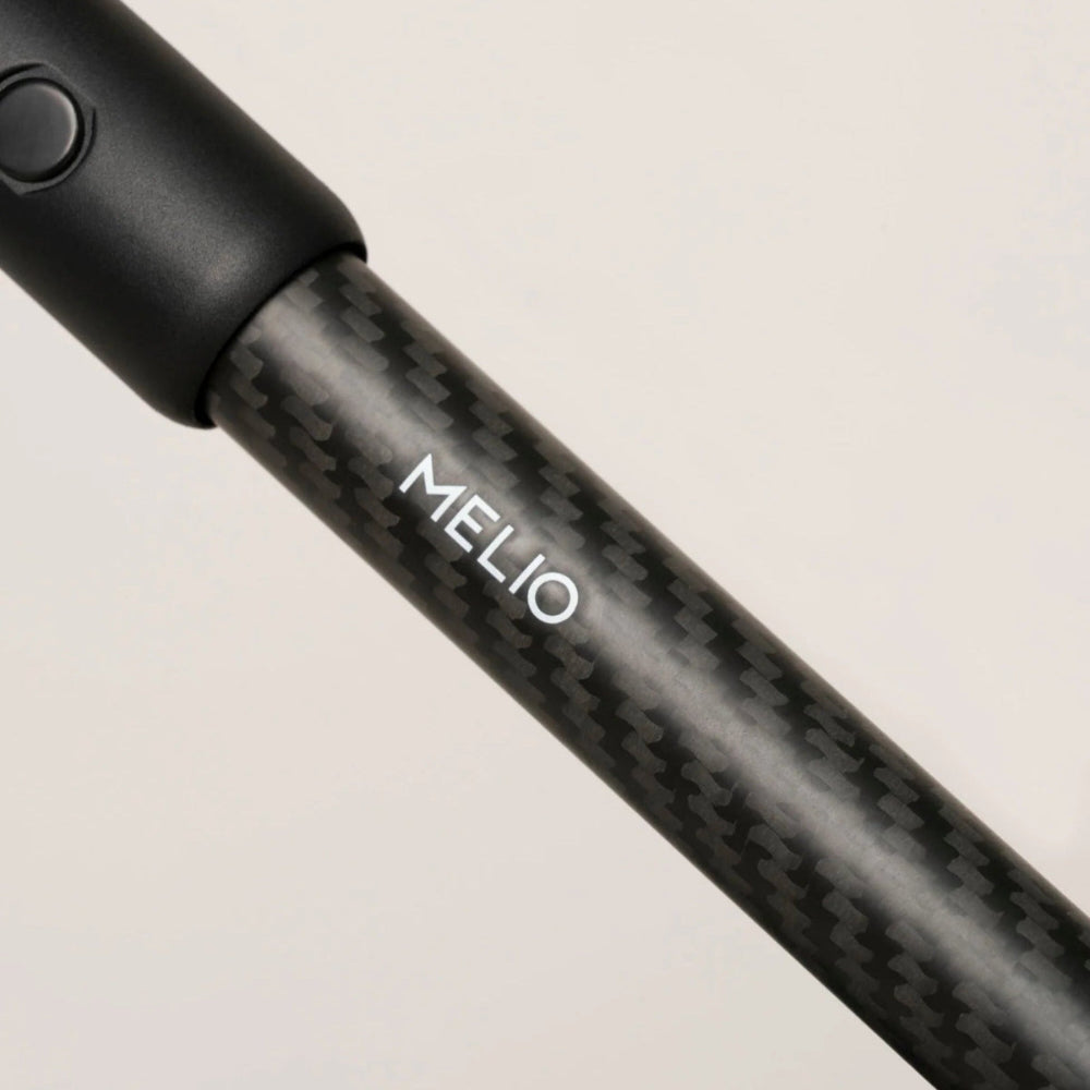 Cybex Melio Carbon 3 stroller handlebar with black carbon fiber finish