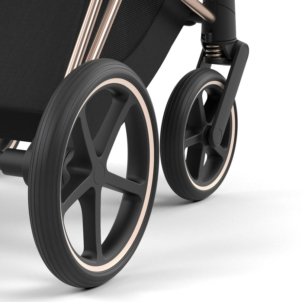 CYBEX Priam 4 Stroller Rose Gold/Sepia Black; close-up shows premium 3-spoke wheels with sepia rims.