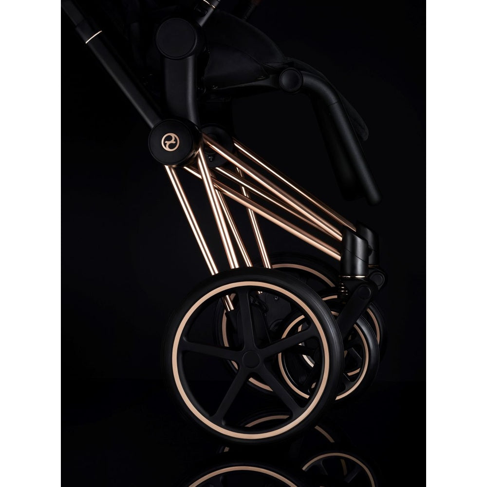 Cybex Priam 4 stroller with rose gold frame and sepia black accents, Lux carry cot included