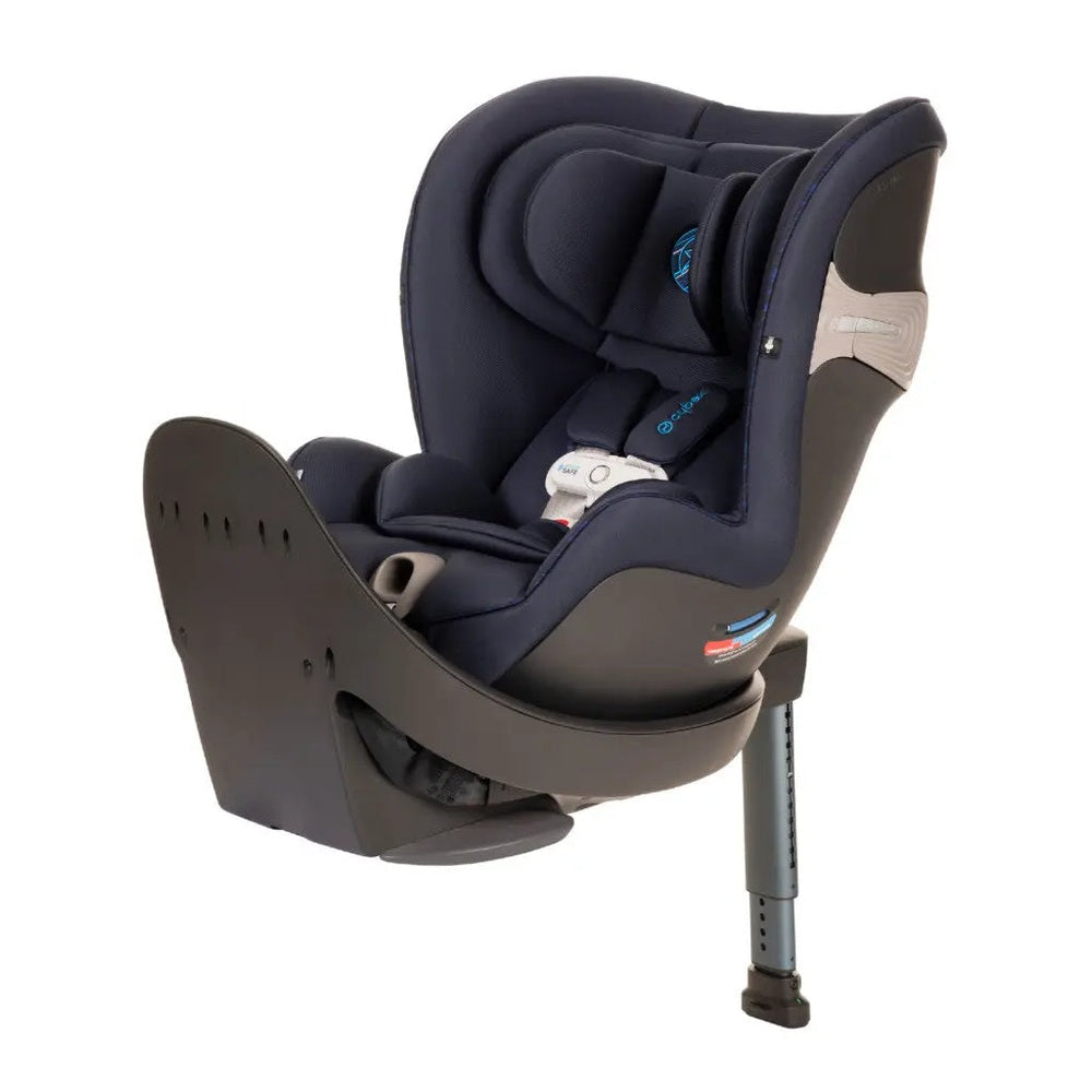 CYBEX Sirona S 360 rotating convertible car seat in navy, mounted on adjustable base with support leg visible.