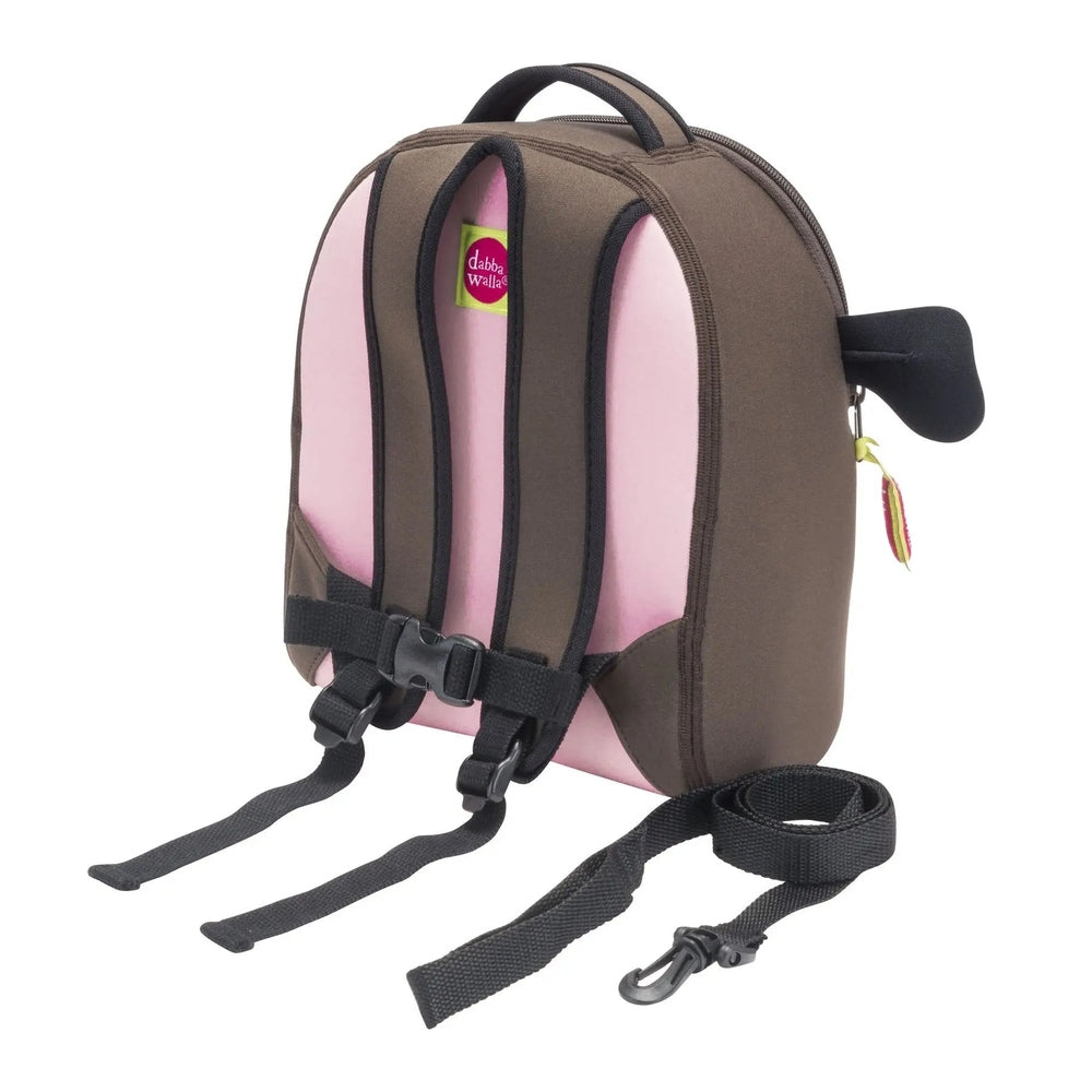 Dabbawalla Harness Backpack brown with pink panels, two adjustable shoulder straps buckled for child safety.