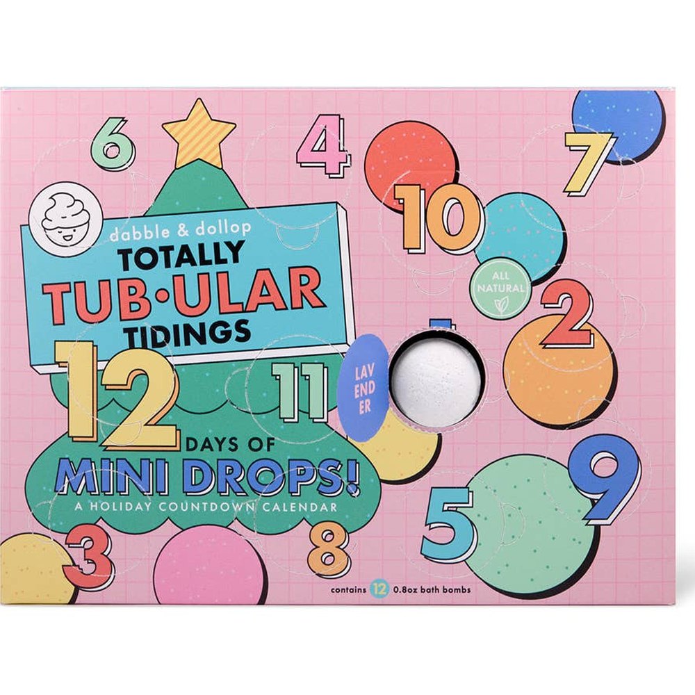 Dabble & Dollop 12 Days of Mini Drops Bath Bomb Countdown Calendar, pink box with numbered days and a bath bomb window.