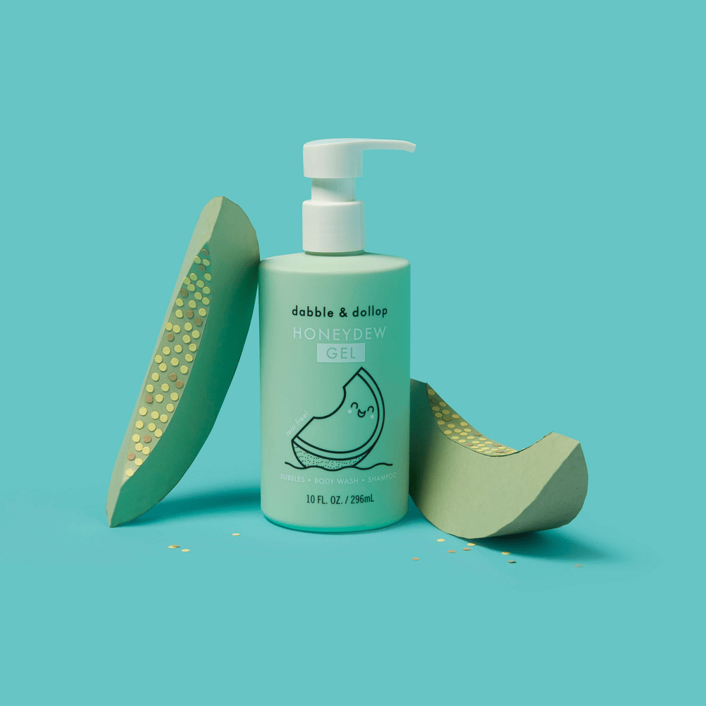 Dabble & Dollop All-Natural Shampoo, Body Wash & Bubbles Honeydew pump bottle in mint green, ready to dispense.