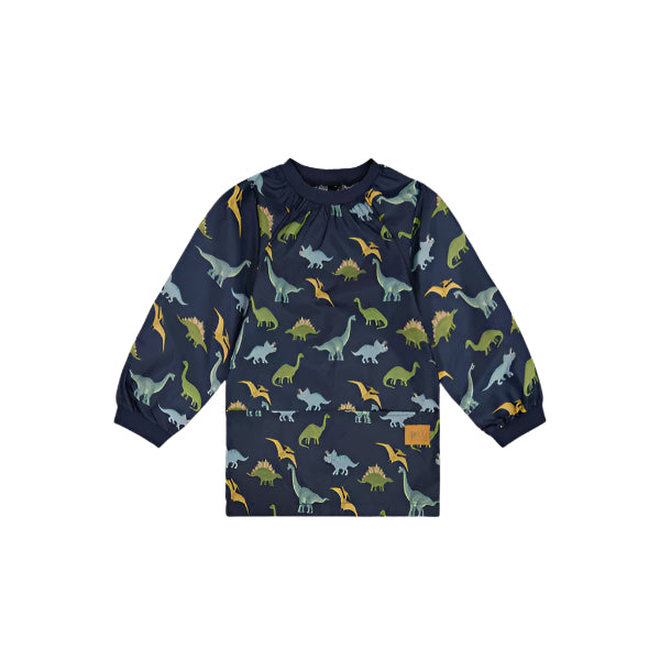 Deux Par Deux School Apron smock in navy with colorful dinosaur print, long sleeves and front pocket.