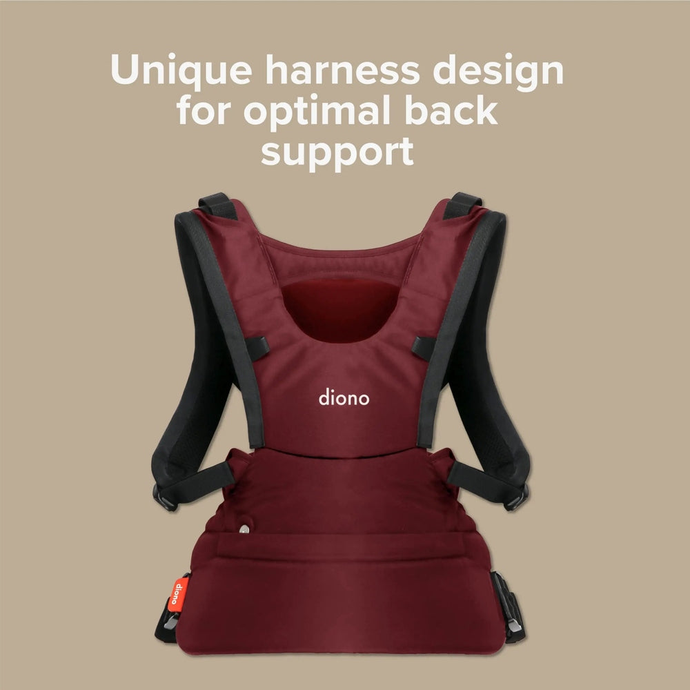 Diono Carus Essentials 3-in-1 baby carrier in burgundy with black padded shoulder straps being worn, highlighting back-support design
