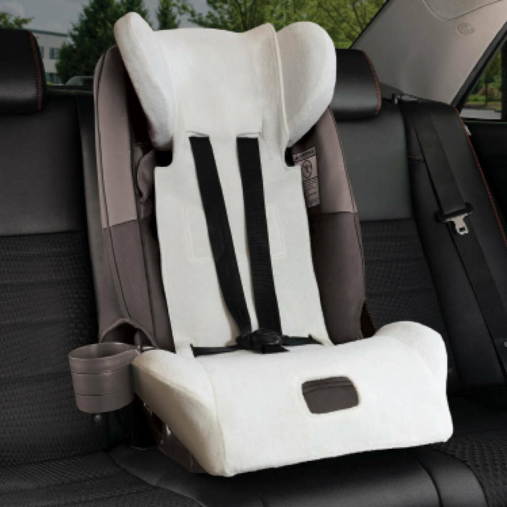Diono Radian Rainier summer cover in white plush padding on car seat headrest model
