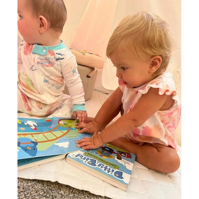 Ditty Bird Sound Book Farm Animal USB-C Rechargeable being explored by two toddlers on a blanket