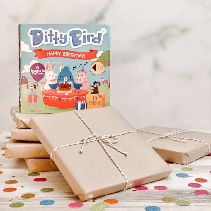 Ditty Bird Sound Book Happy Birthday USB-C rechargeable, colorful cover shown with gift-wrapped presents.