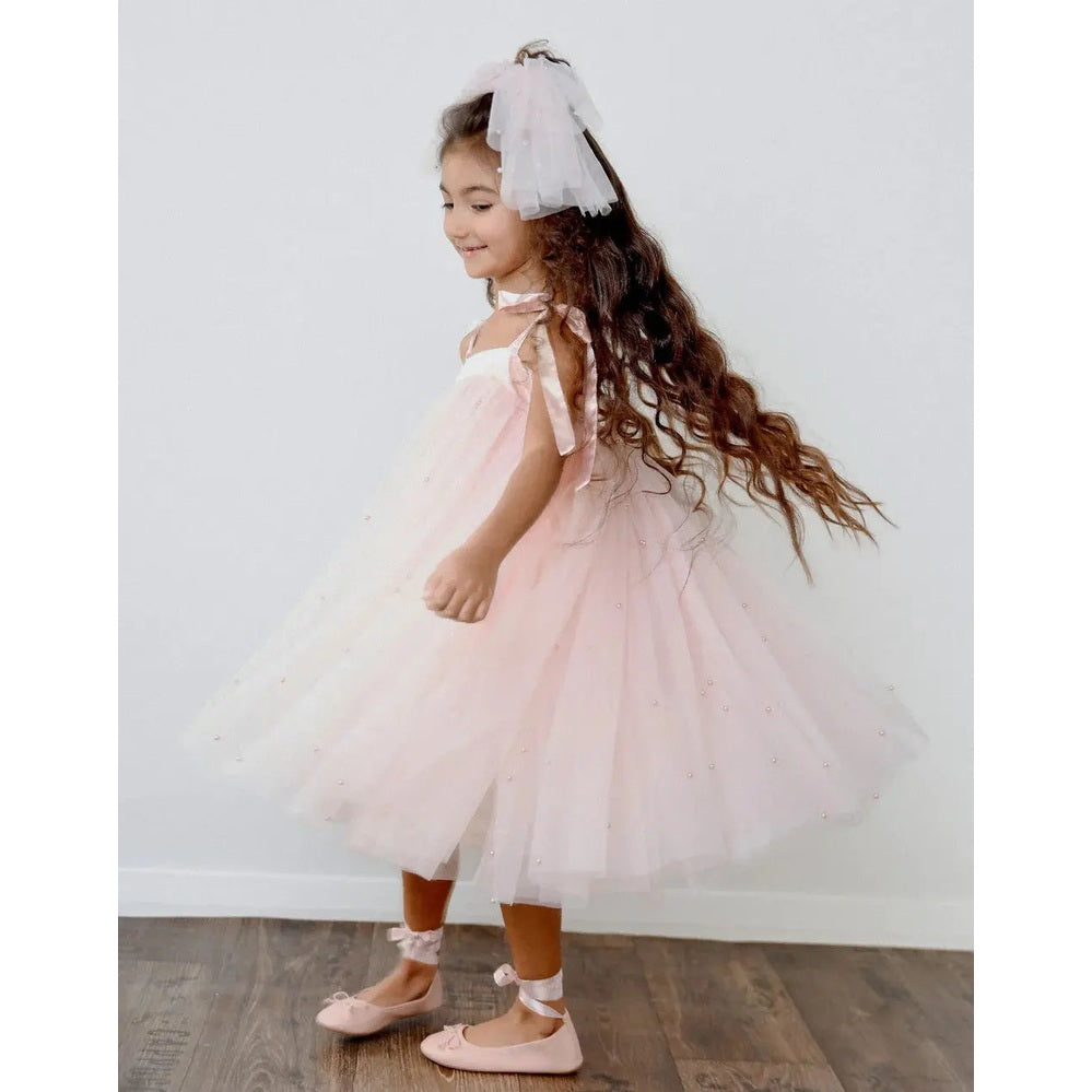 Dolly By Le Petit Pearl 2-Cute Tulle Dress Dolly Pink: girl twirls in pink tulle with ribbon straps and ballet flats.