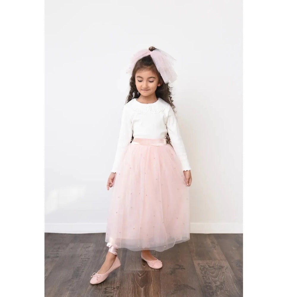 Dolly By Le Petit Pearl 2-Cute Tulle Dress Dolly Pink: girl in white top and pink tulle skirt with bow headband.