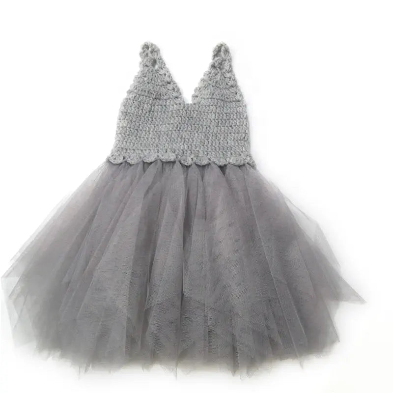 Dolly by Le Petit Tom crochet tutu dress in silver grey; V-neck crochet bodice with a voluminous tulle skirt.