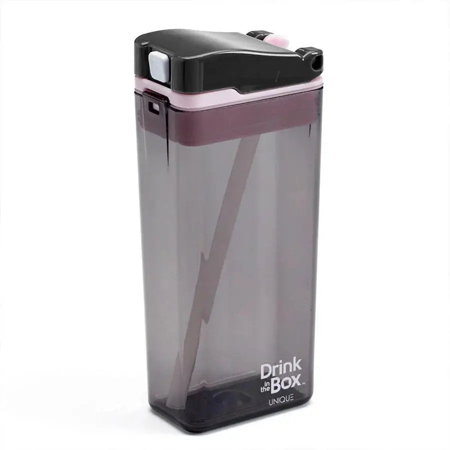 Drink In The Box water bottle with pink flip-top lid and straw, transparent gray body, standing upright.