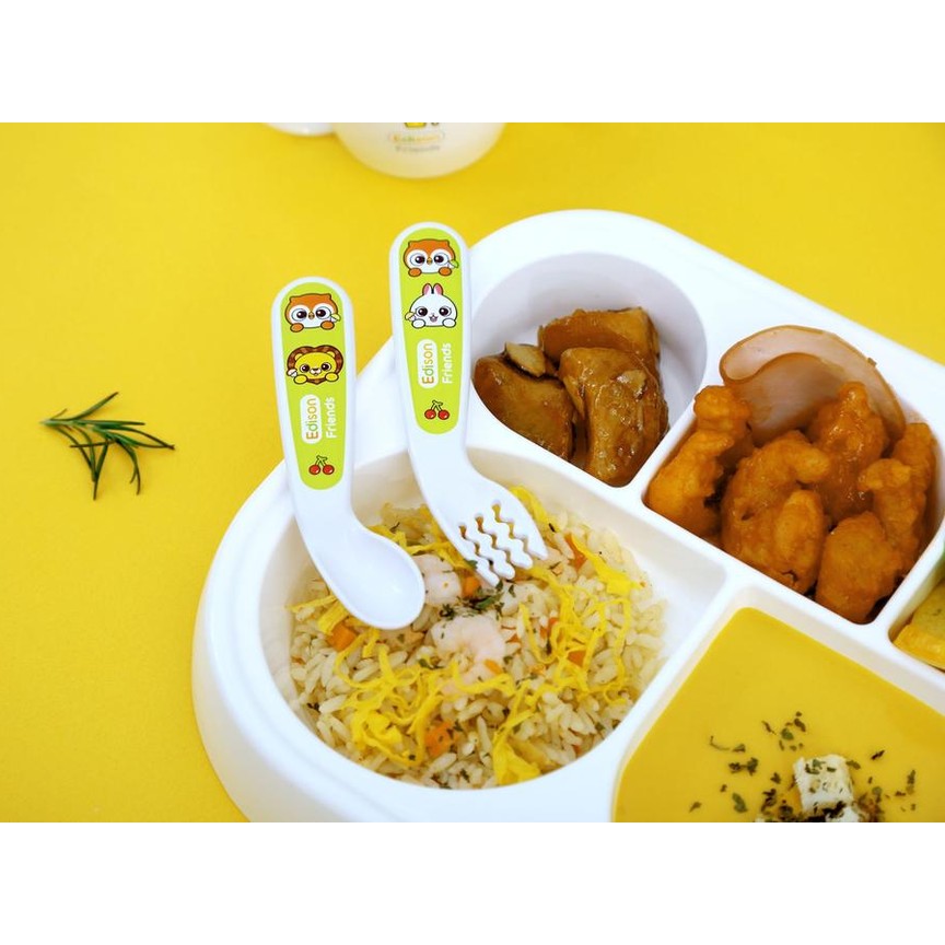 Edison Self Spoon & Fork Case Set, white 2-piece utensils with cartoon characters on green labels beside a divided meal tray.