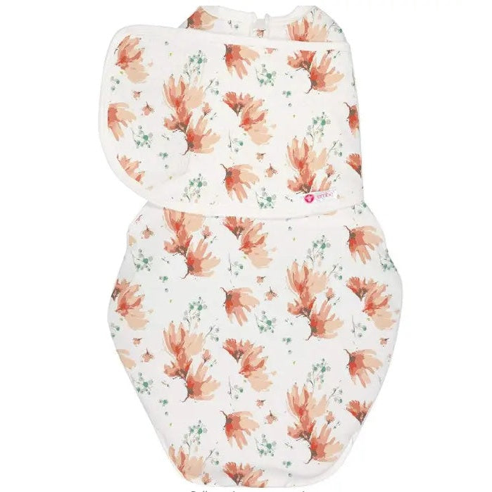 Embe Starter Swaddle, white floral print two-piece set, laid flat showing wrap wings.