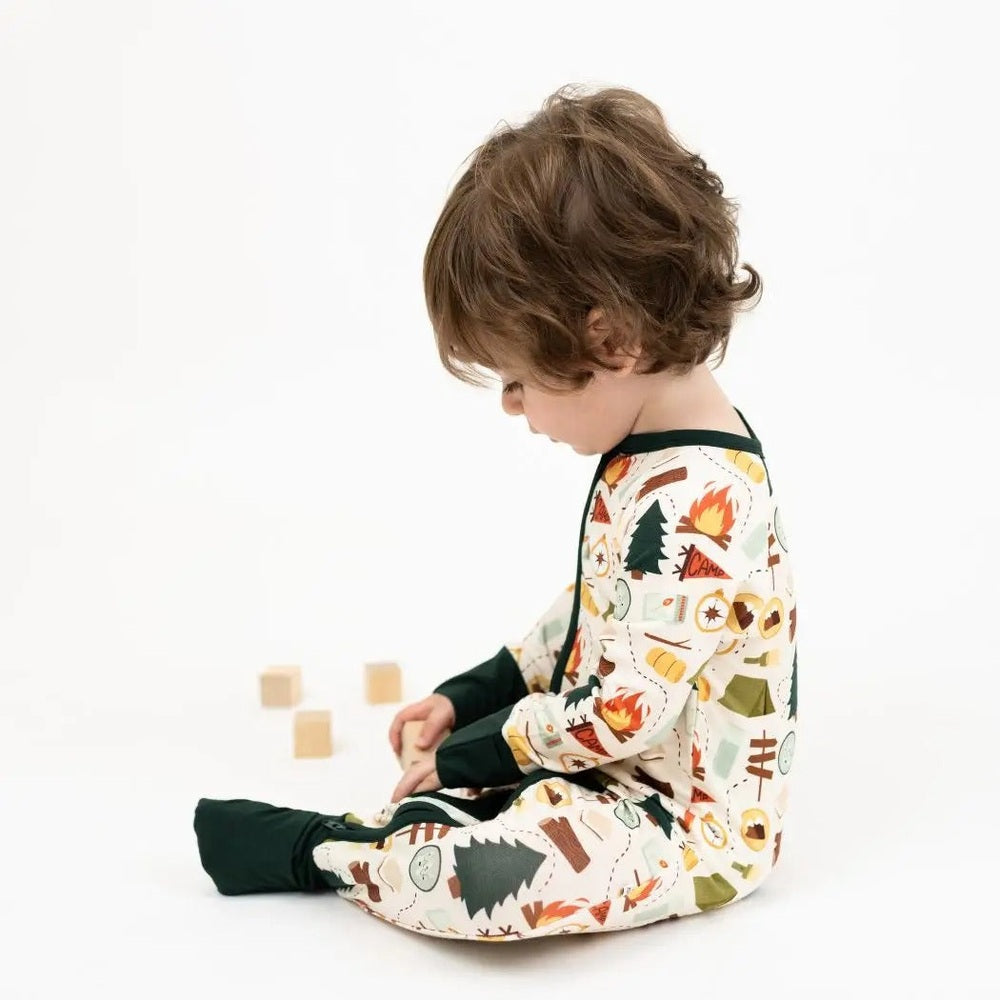 Emerson And Friends Camp Emerson Bamboo Convertible Baby Pajamas Cream with colorful camping print and green trim side view