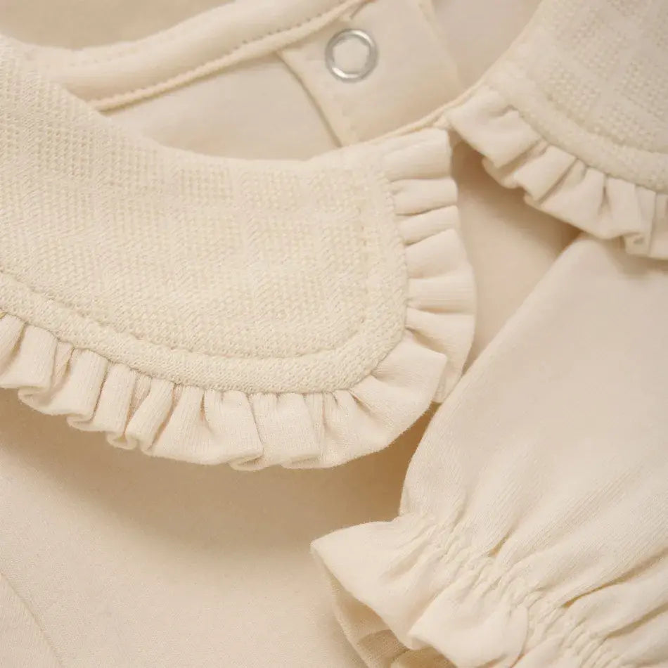 EN FANT ivory long-sleeve baby bodysuit with a ruffled collar