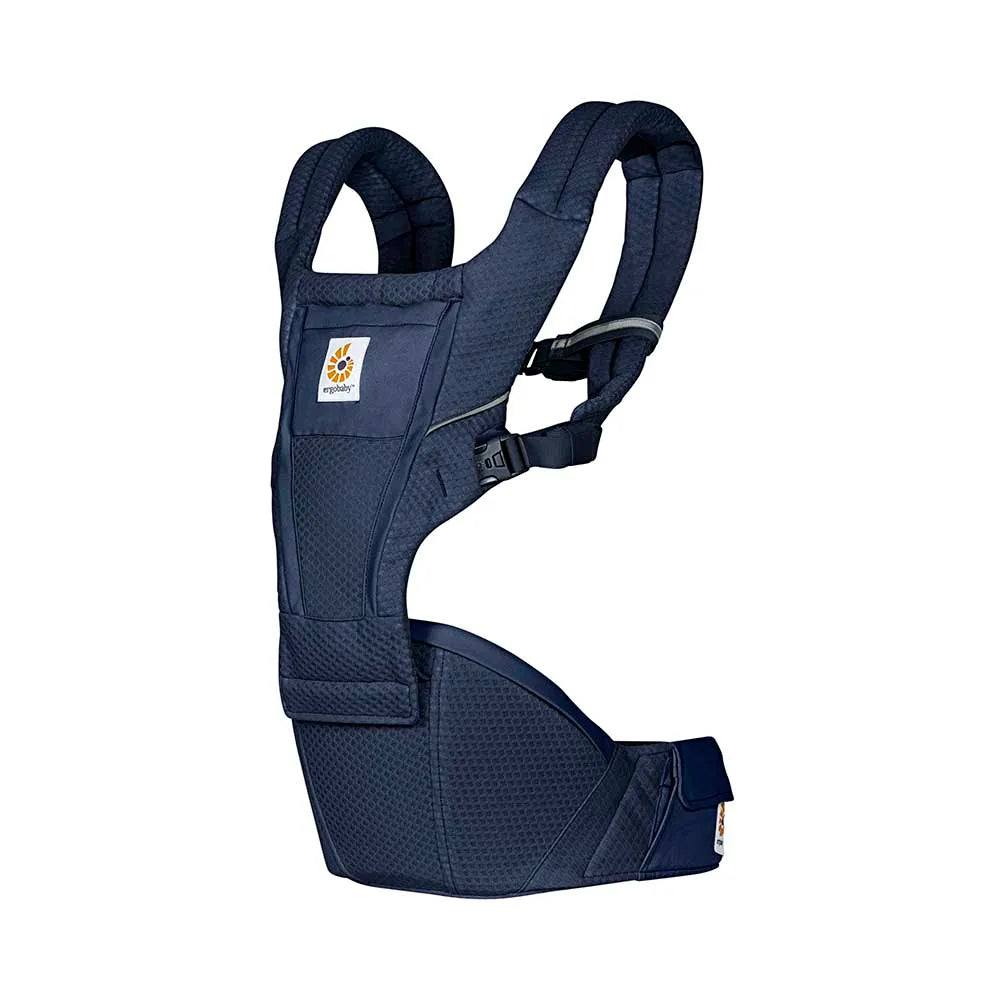 Ergobaby Alta Hip Seat Baby Carrier in navy, worn with padded straps and secure waist belt.