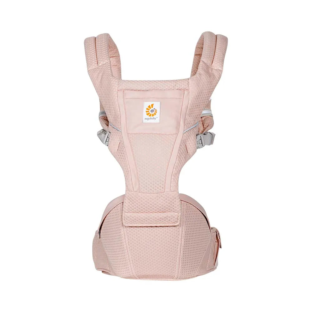 Ergobaby Alta Hip Seat Baby Carrier in pink rose worn by caregiver, showing padded straps and breathable fabric.
