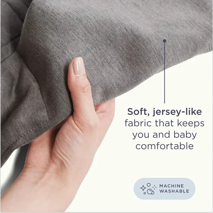 Ergobaby Embrace Knit Newborn Carrier Sage Meadows, soft jersey-like fabric held to show baby comfort; machine washable.