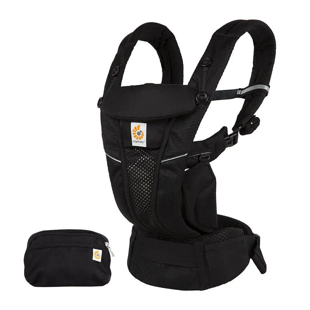 Ergobaby Omni Breeze baby carrier in black with breathable mesh panels and adjustable straps, shown with a matching pouch.