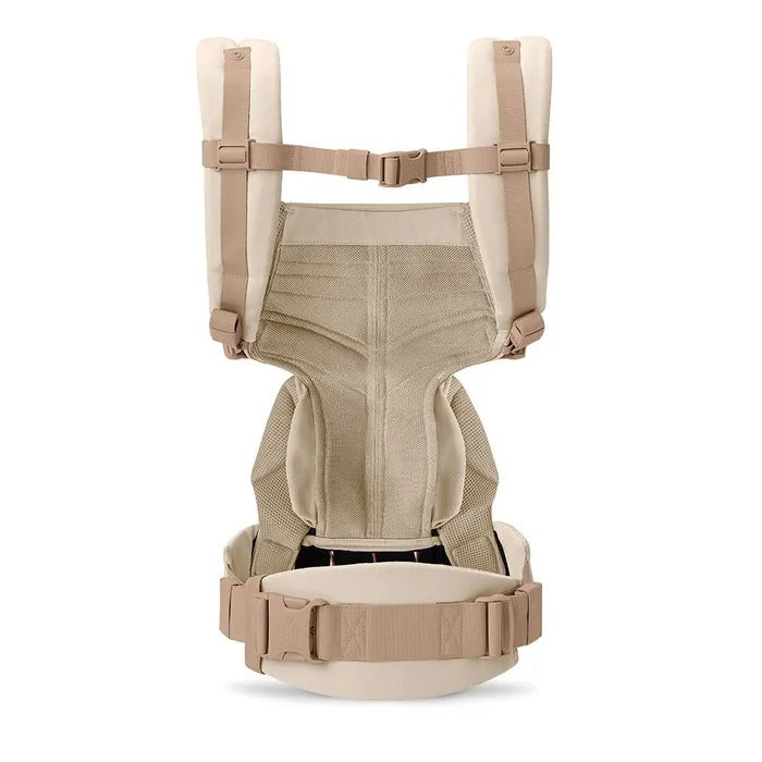Ergobaby Omni Classic Mesh Baby Carrier Natural Beige worn on back with padded shoulder straps and secure waist belt.