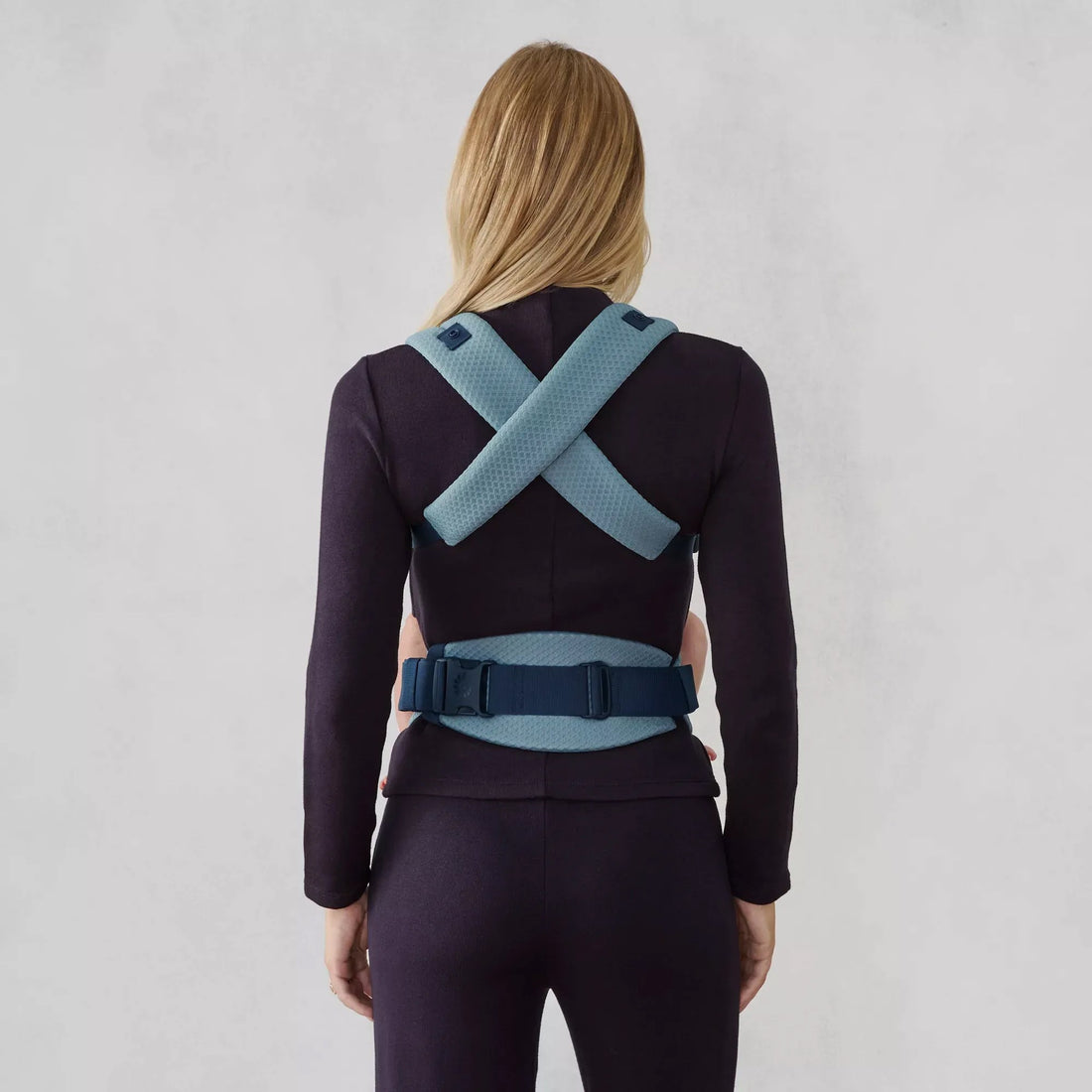 Ergobaby Omni Lite Baby Carrier in Slate Blue, back strap view worn with baby