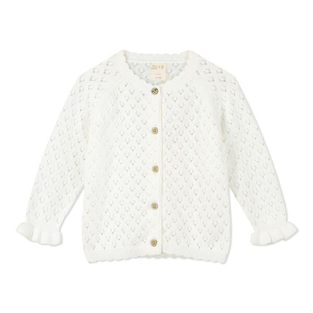 Ettie & H Aurora Cardigan White, ivory knit with wooden front buttons and ribbed cuffs laid flat.