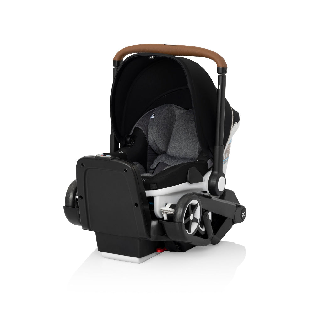 Evenflo Gold Shyft Dualride infant car seat and stroller combo, gray seat, black frame, brown handle.