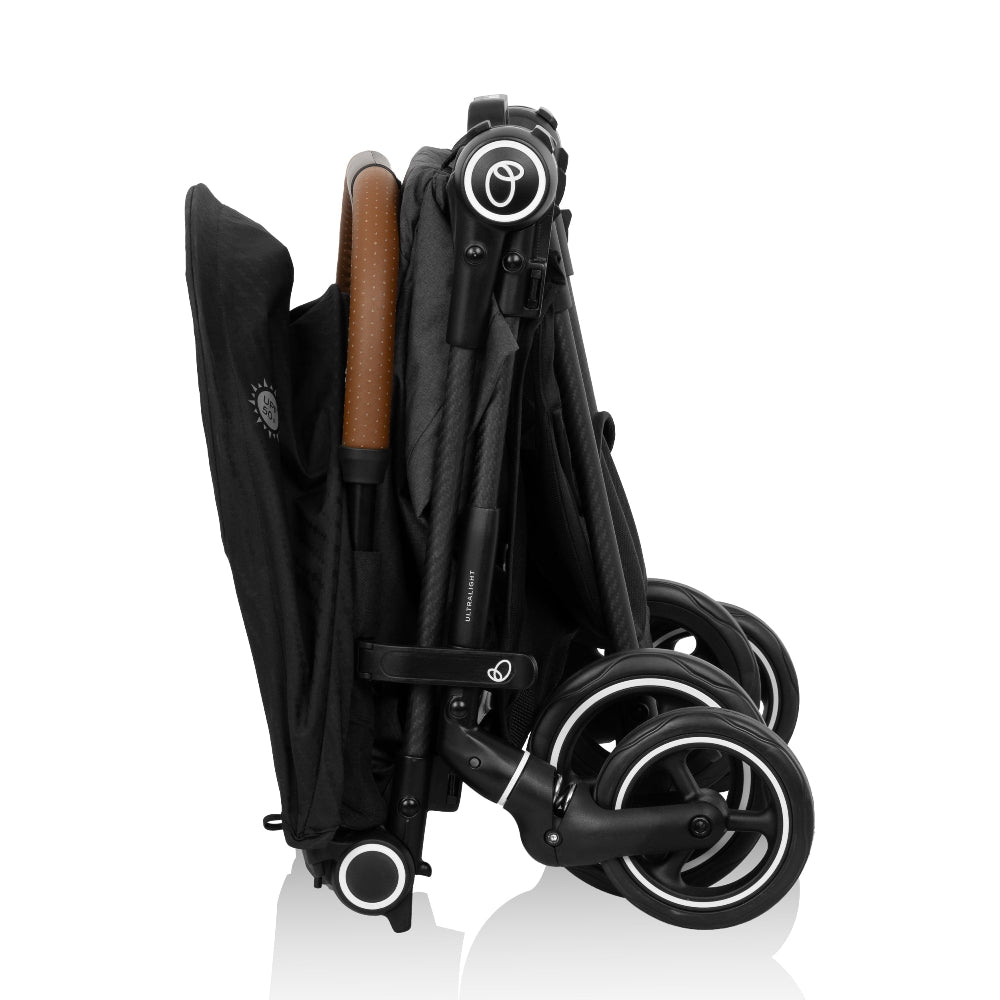 Evenflo Hummingbird ultralight carbon fiber stroller folded compactly with black frame and wheels